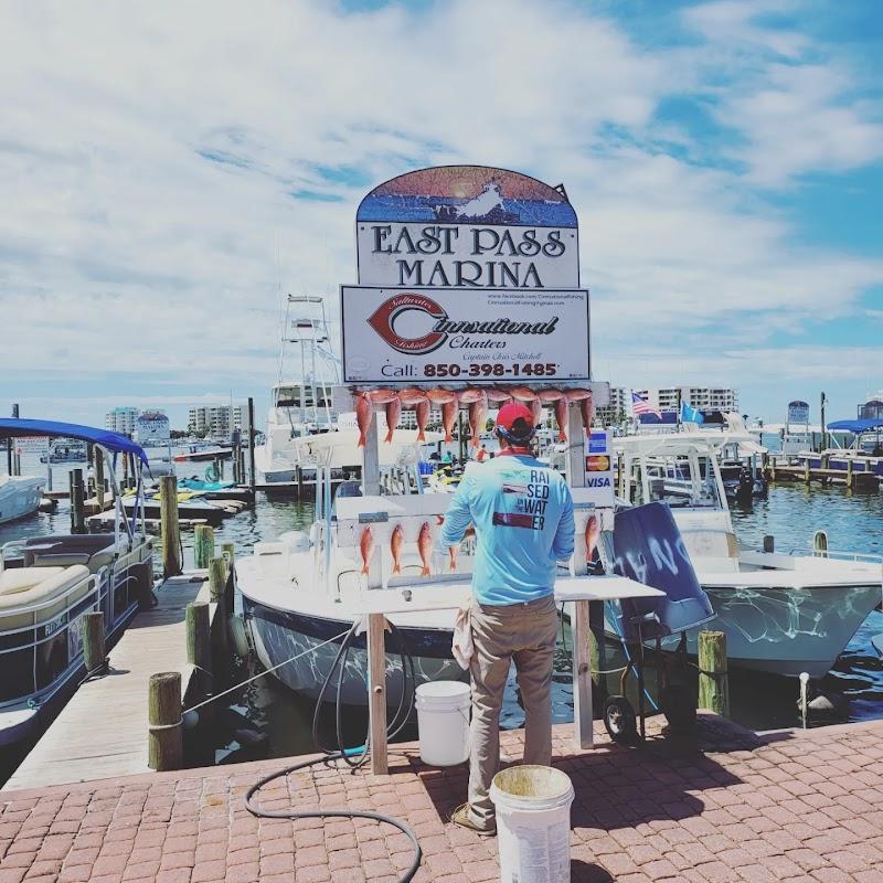 Red snapper catch hanging at the Cinnsational Saltwater Fishing cleaning station, East Pass Marina, Destin FL