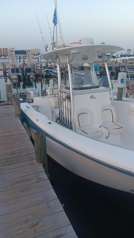 Cinnsational Saltwater Fishing Cape Horn center console boat docked in Destin Florida marina at sunrise